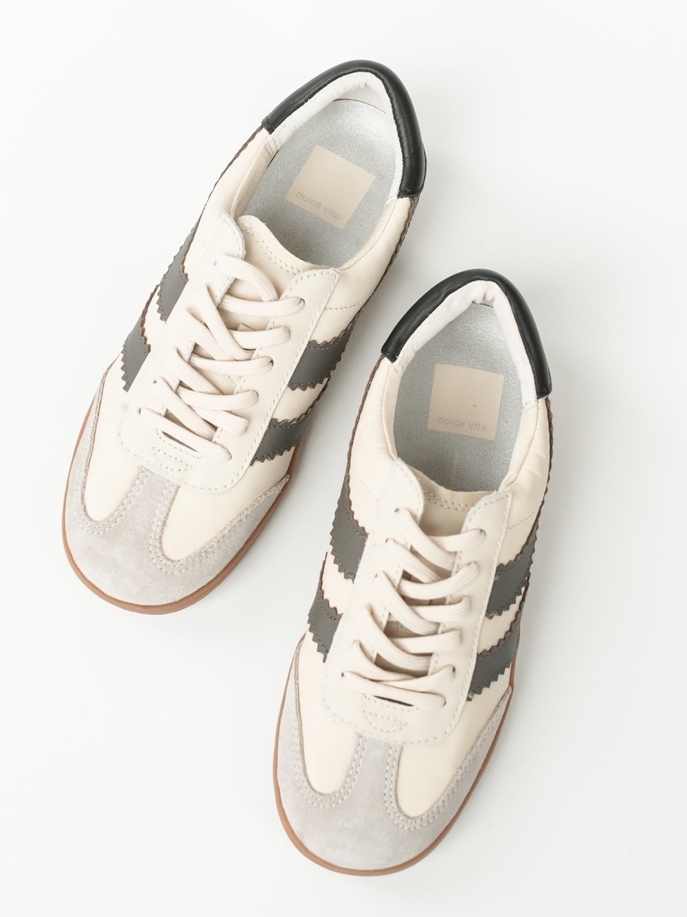 Dolce Vita Cream and Black Lace-Up Sneakers